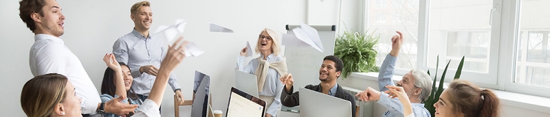 A meeting of employees celebrating the successful launch of their company.